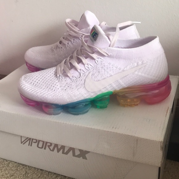 white nikes with rainbow bottom